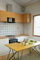 kitchen station with minimal style decoration with white tone and brown wood color photo