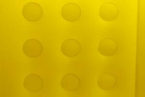 cheese texture background yellow block with the  rubber inflatable photo