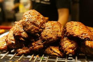 grilled  pork rib BBQs with barbeque sauce  on grill photo