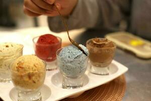 close up colorful icecream shot scoop on salver tray photo