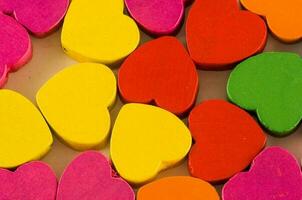 Colorful wooden hearts photo