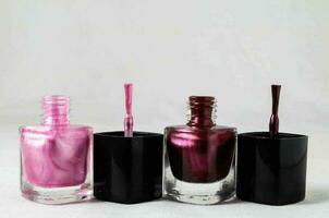 Nail polishers on white background photo