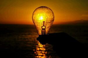 Bulb over the sunset photo