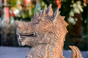 Asian carved statue close-up photo