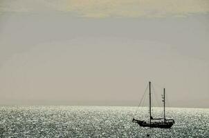 Ocean view with boat photo