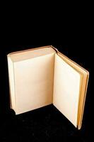 Isolated book on black background photo