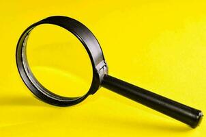 Isolated magnifying glass photo