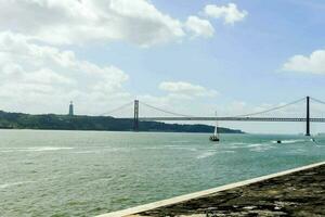 View with bridge by the sea photo