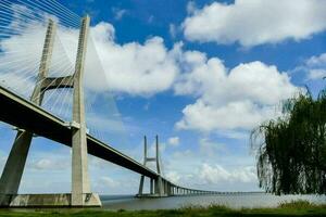 View with bridge by the sea photo