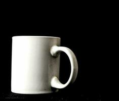 Mug on black background photo