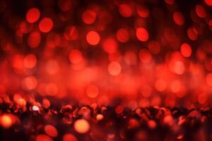 Abstract Christmas background with bokeh defocused lights and red color. photo