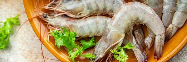 fresh shrimp raw prawn gambas seafood meal food snack on the table copy space food background rustic top view photo