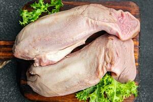 tongue raw pork meat meal food snack on the table copy space food background rustic top view photo