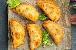 empanadas pies stuffed meat meal food snack on the table copy space food background rustic top view photo