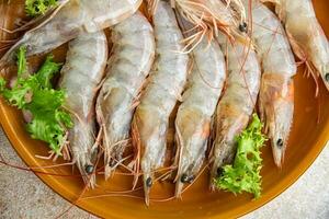 fresh shrimp raw prawn gambas seafood meal food snack on the table copy space food background rustic top view photo