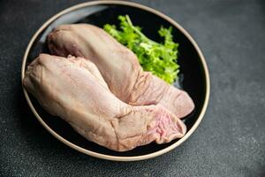 tongue pork raw meat meal food snack on the table copy space food background rustic top view photo