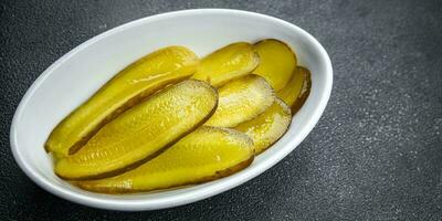 cucumber slice pickled for sandwich vegetable food meal snack on the table copy space food background rustic top view photo