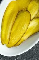 cucumber slice pickled for sandwich vegetable food meal snack on the table copy space food background rustic top view photo
