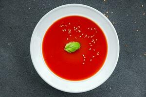 gazpacho tomato soup first course healthy meal food snack on the table copy space food background rustic top view keto or paleo diet veggie vegan or vegetarian food photo