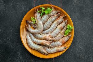 fresh shrimp raw prawn gambas seafood meal food snack on the table copy space food background rustic top view photo