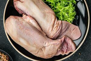 tongue pork raw meat meal food snack on the table copy space food background rustic top view photo