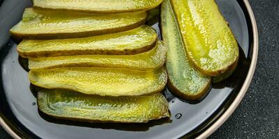 cucumber slice pickled for sandwich vegetable food meal snack on the table copy space food background rustic top view photo