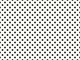 black polka dots over snow background photo