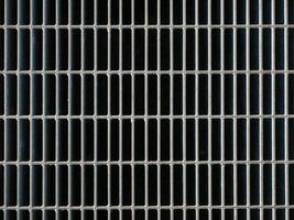 industrial style grey steel mesh texture background photo