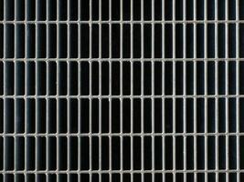 industrial style grey steel mesh texture background photo