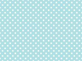 white polka dots over powder blue background photo