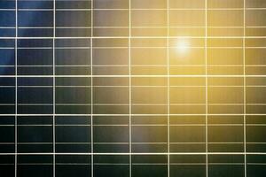 Solar Cell Panel Background with Reflection of Sun. photo