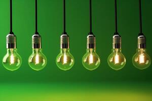 Idea concept on light bulb hanging on green background, photo