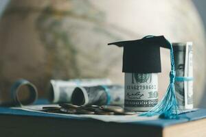 Graduation cap with Earth globe. Concept of global business study, abroad educational, Back to School. Education in Global world, Study abroad business in universities in worldwide. language study photo