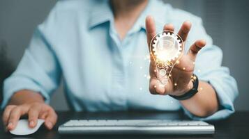 Hands holding light bulb for Concept new idea concept. Innovation and inspiration, innovative technology in science and communication idea. intelligent innovation ideas. creative business success. photo