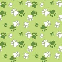 Cute colors animal footprints on green background. vector