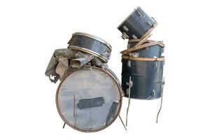 Drum Kit old broken against pink background. Have clipping path photo