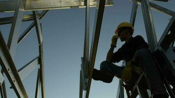 Worker with Walkie Talkie in Hand. Construction Site Communication. Slow Motion Footage. video