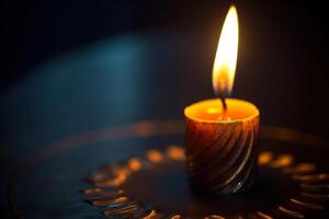 burning candle in dark photo
