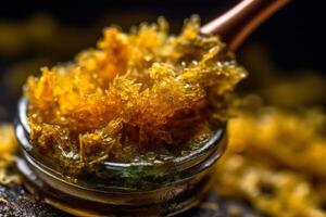 golden resin concentrate cannabis with high thc photo