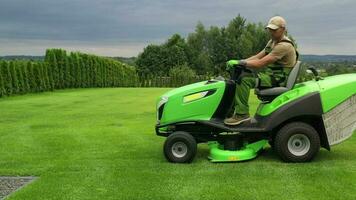 Lawn Care On Cloudy Summer Day. video