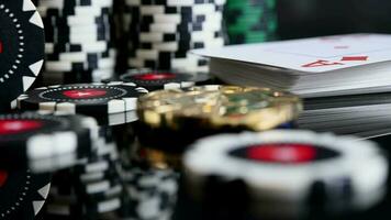 Close Up Of Casino Poker Chips And Pack Of Playing Cards With Diamond Ace On Top. video