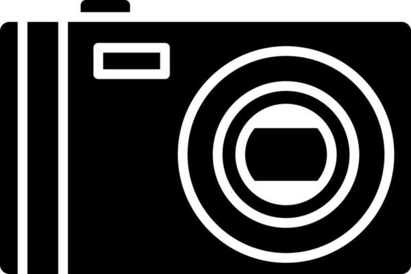 Black and White illustration of digital camera icon.