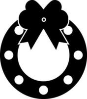 Bow decorated black and white wreath. vector