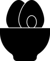 Easter eggs in bowl icon or symbol. vector