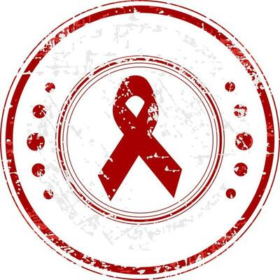 Grungy rubber stamp with awareness ribbon.