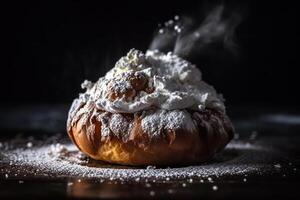 bun with cream, eclair in powdered sugar photo