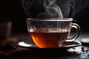 glass cup of hot black tea photo