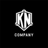 KN logo initial with shield shape design style vector