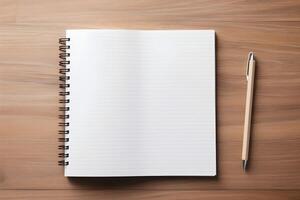 A blank notepad and a pen lie on a rustic wooden surface, inviting the viewer to fill the empty pages with their thoughts, ideas, and musings. photo
