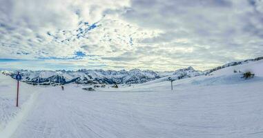 Ski slope in Austria during winter time photo